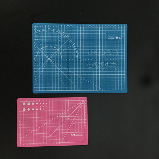 Blue and Pink Gridded Cutting Mats